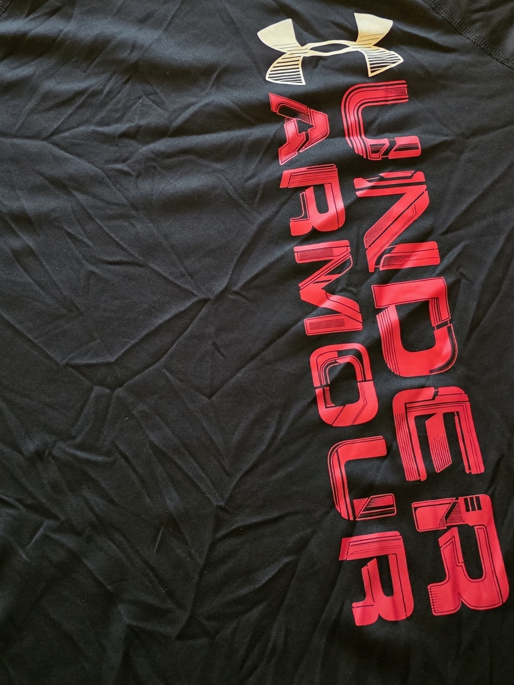 Under Armour Black Short Sleeve Tee with Red Vertical Script and Gold Logo